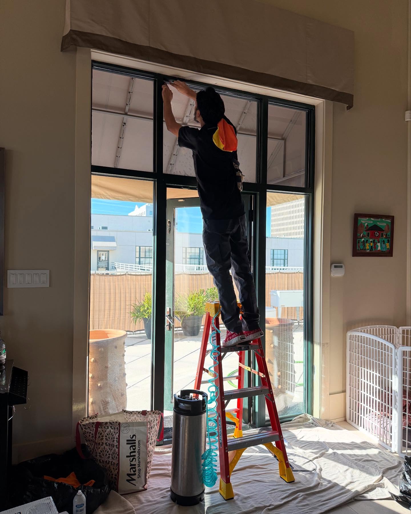 Window tint turbo tint professional installation on business retail door 