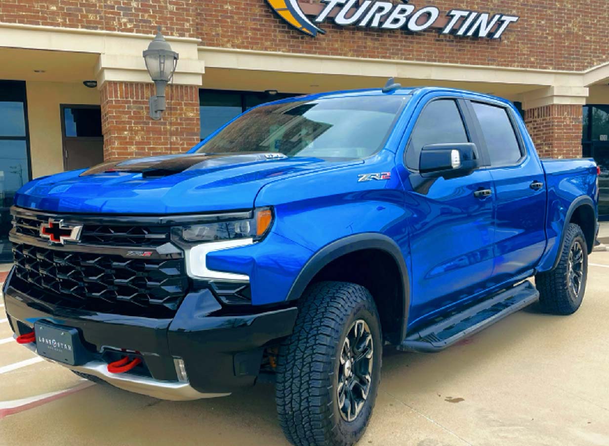 Turbo tint work example after window tint blue Truck Chevy