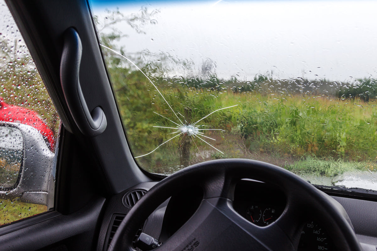 Car interior with a cracked windshield Clearplex windshield protection would prevent this