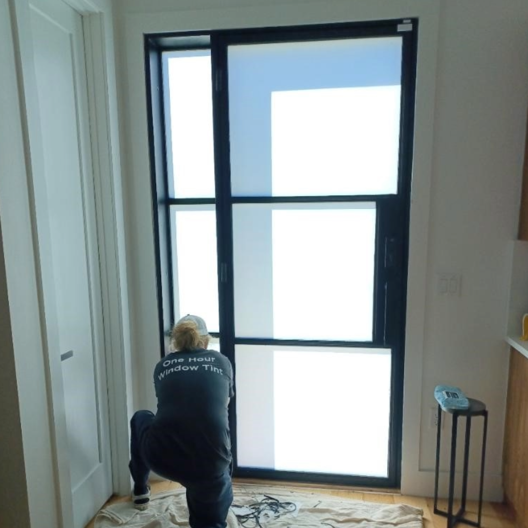 Front door professional window protection installation. Privacy film installed by turbo tint professional 